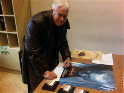 Bruce Cockburn signing for Facebook