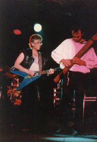 Bruce Cockburn playing the Flying V in 1984